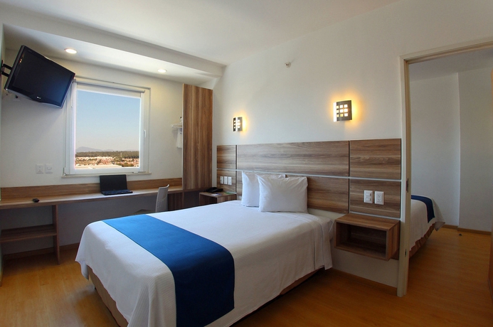 Imagen de la habitación del Hotel One Guadalajara Periferico Norte. Foto 8