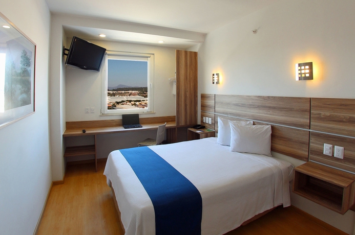 Imagen de la habitación del Hotel One Guadalajara Periferico Norte. Foto 10