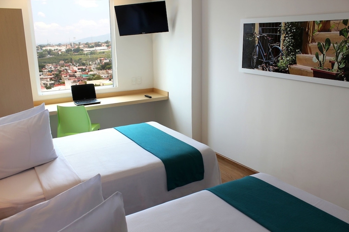 Imagen de la habitación del Hotel One Guadalajara Tapatio. Foto 7