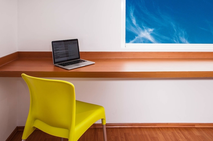 Imagen de la habitación del Hotel One Guadalajara Tapatio. Foto 11