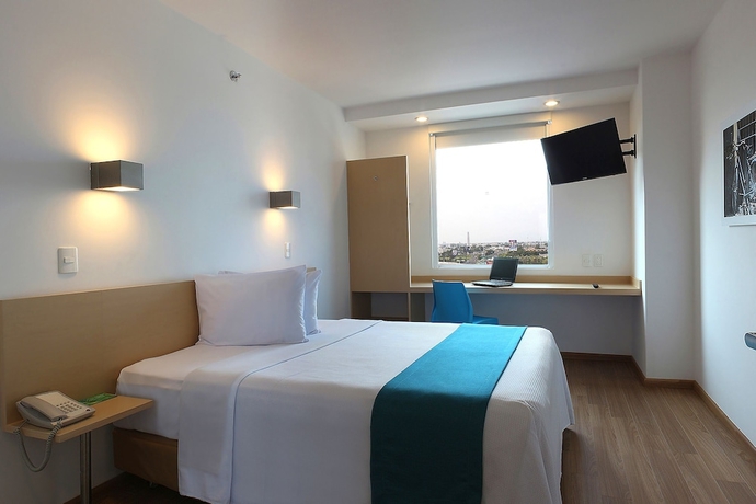 Imagen de la habitación del Hotel One Guadalajara Tapatio. Foto 12