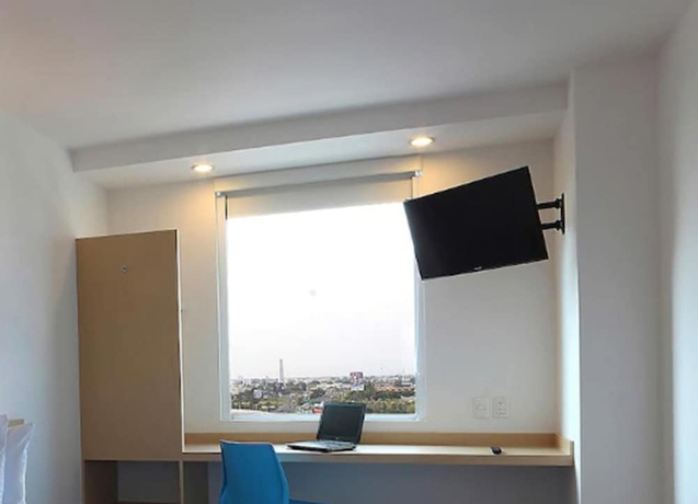 Imagen de la habitación del Hotel One Guadalajara Tapatio. Foto 14