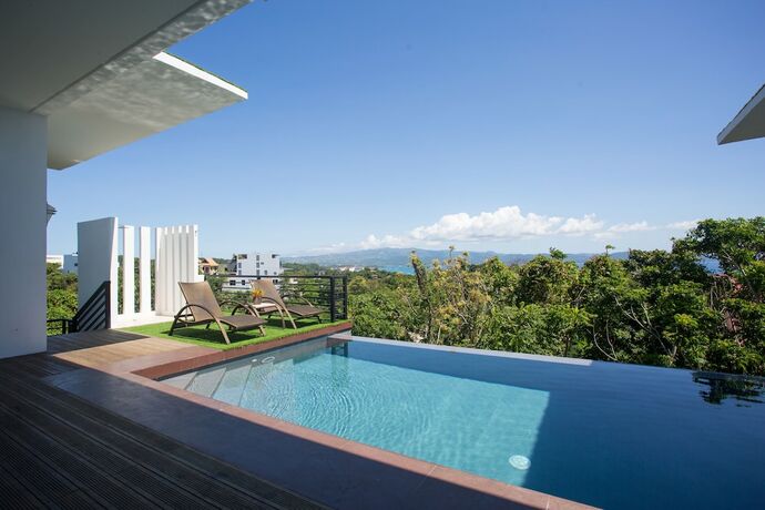 Imagen de la habitación del Hotel One Hagdan Villas. Foto 3
