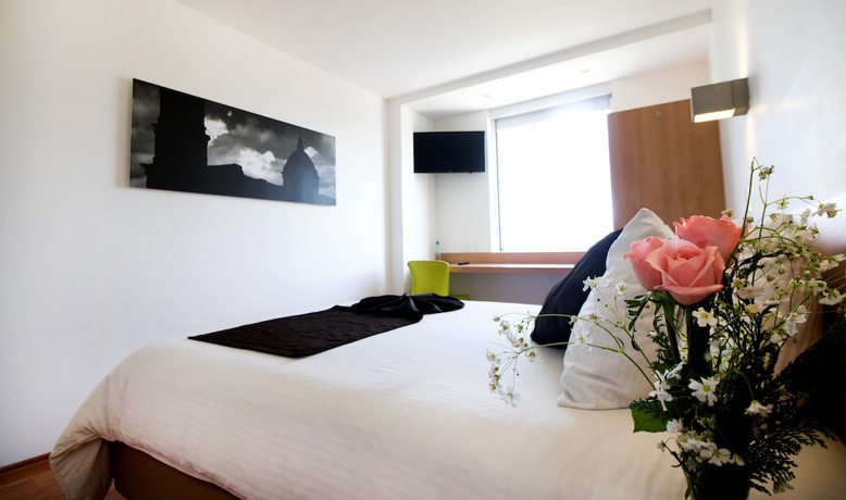 Imagen de la habitación del Hotel One Irapuato. Foto 12