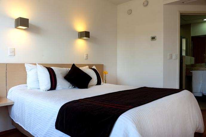 Imagen de la habitación del Hotel One Irapuato. Foto 14