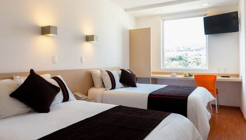 Imagen de la habitación del Hotel One Irapuato. Foto 17