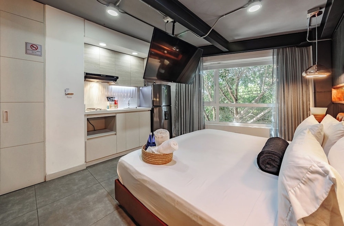Imagen de la habitación del Hotel One Laureles. Foto 5