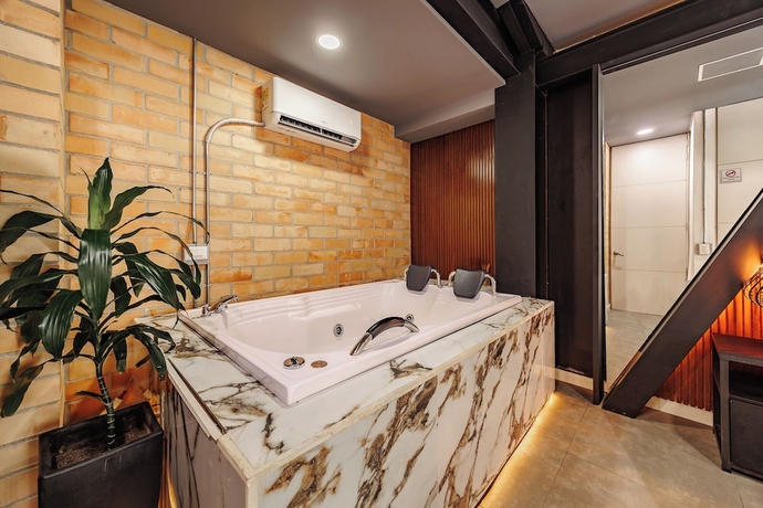 Imagen de la habitación del Hotel One Laureles. Foto 9