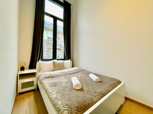 Imagen de la habitación del Hotel One Lux Stay Near Fashion District. Foto 10