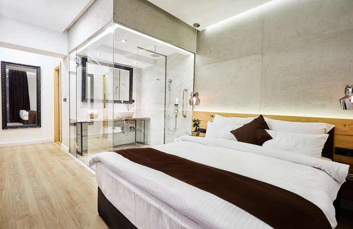 Imagen de la habitación del Hotel One Luxury Suites. Foto 3