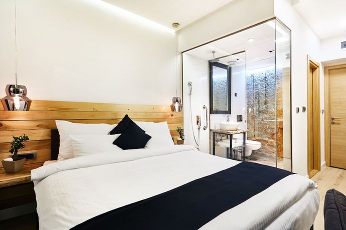 Imagen de la habitación del Hotel One Luxury Suites. Foto 5