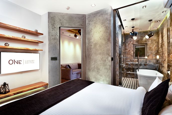 Imagen de la habitación del Hotel One Luxury Suites. Foto 8