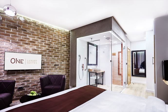 Imagen de la habitación del Hotel One Luxury Suites. Foto 9