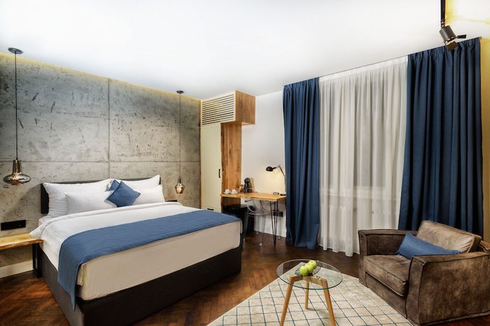 Imagen de la habitación del Hotel One Luxury Suites. Foto 10