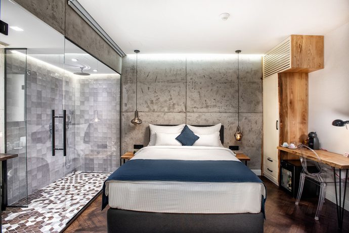 Imagen de la habitación del Hotel One Luxury Suites. Foto 17