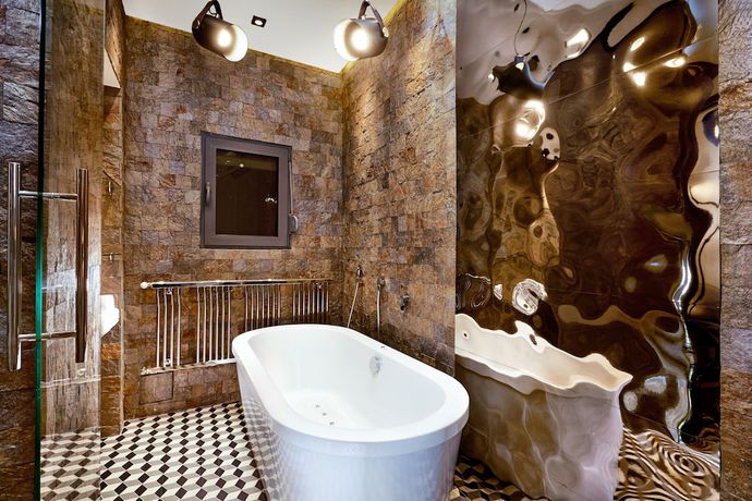 Imagen de la habitación del Hotel One Luxury Suites. Foto 18