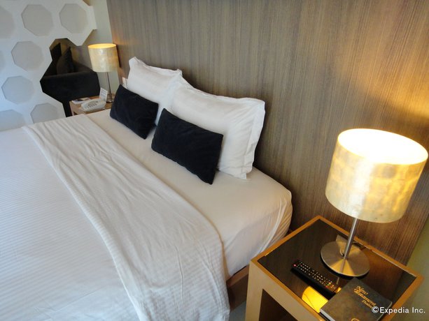 Imagen de la habitación del Hotel One Manalo Place. Foto 3
