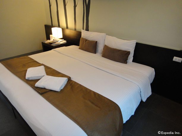Imagen de la habitación del Hotel One Manalo Place. Foto 6