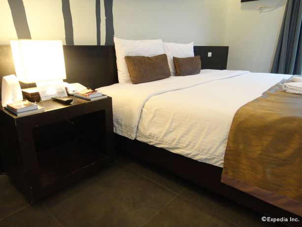 Imagen de la habitación del Hotel One Manalo Place. Foto 7