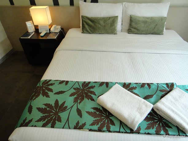 Imagen de la habitación del Hotel One Manalo Place. Foto 9