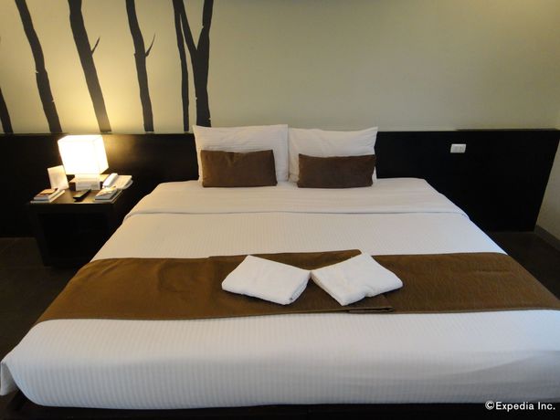 Imagen de la habitación del Hotel One Manalo Place. Foto 11