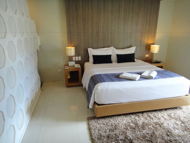 Imagen de la habitación del Hotel One Manalo Place. Foto 13
