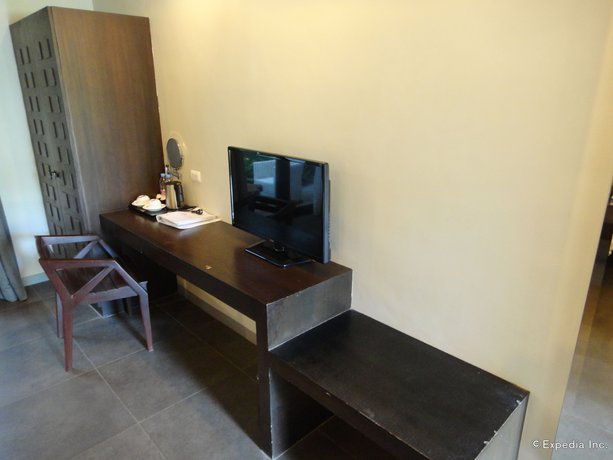 Imagen de la habitación del Hotel One Manalo Place. Foto 16