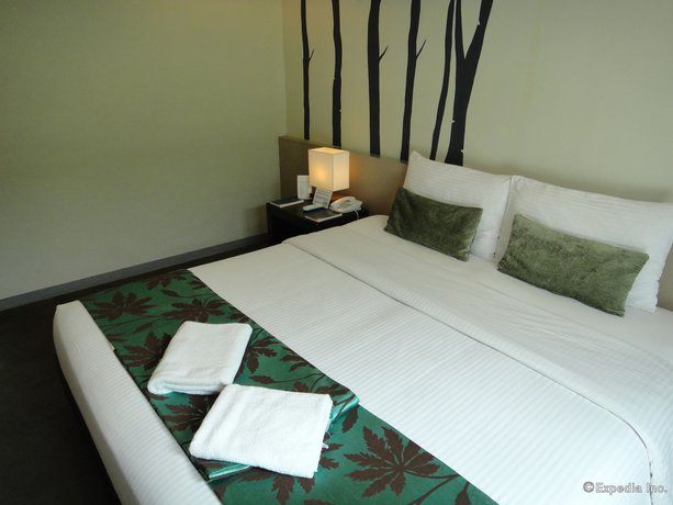 Imagen de la habitación del Hotel One Manalo Place. Foto 18