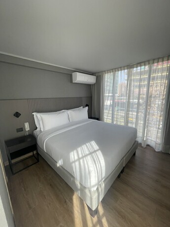 Imagen de la habitación del Hotel One Manquehue. Foto 24