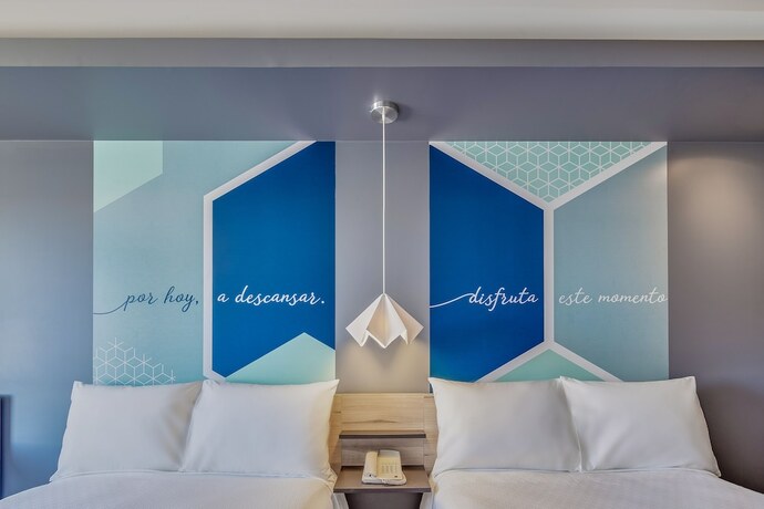 Imagen de la habitación del Hotel One Mazatlán. Foto 15