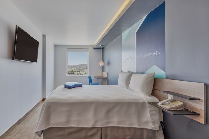 Imagen de la habitación del Hotel One Mazatlán. Foto 17