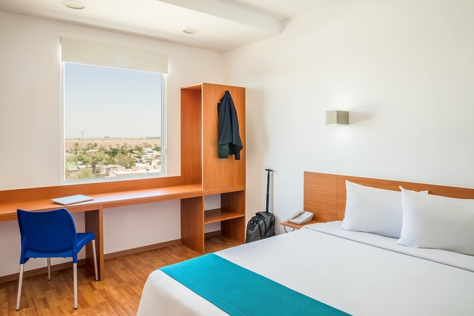 Imagen de la habitación del Hotel One Mexicali. Foto 8