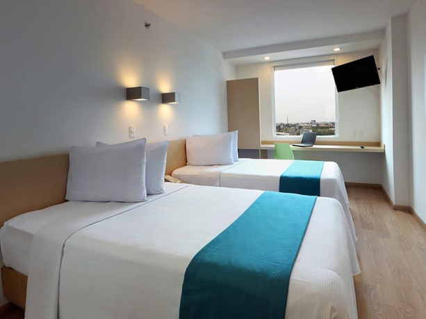 Imagen de la habitación del Hotel One Mexicali. Foto 10