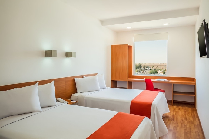 Imagen de la habitación del Hotel One Mexicali. Foto 11