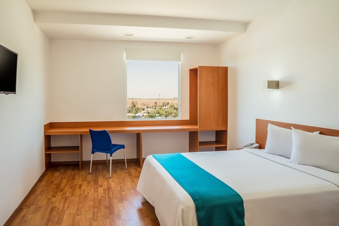 Imagen de la habitación del Hotel One Mexicali. Foto 12