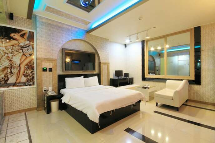 Imagen de la habitación del Hotel One Motel. Foto 19