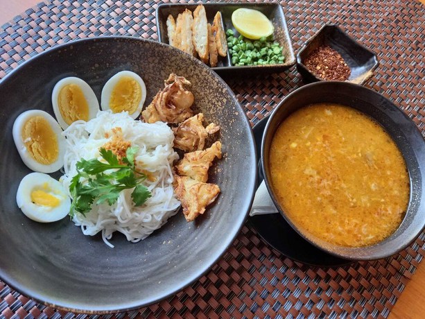 Imagen del bar/restaurante del Hotel One Myanmar Resort Nay Pyi Taw. Foto 3