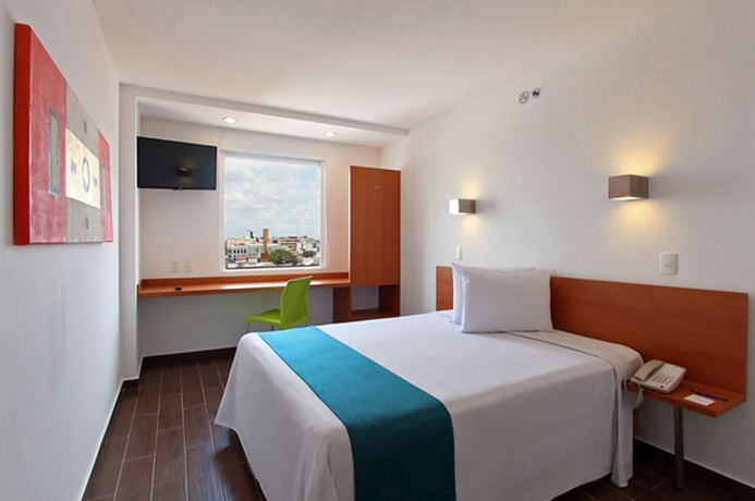 Imagen de la habitación del Hotel One Oaxaca Centro. Foto 9