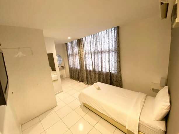Imagen general del Hotel One One 08 Tapah. Foto 10