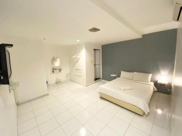 Imagen de la habitación del Hotel One One 08 Tapah. Foto 11