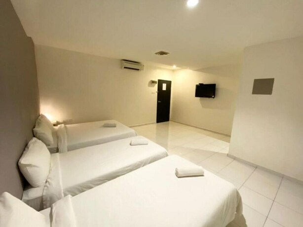 Imagen de la habitación del Hotel One One 08 Tapah. Foto 12