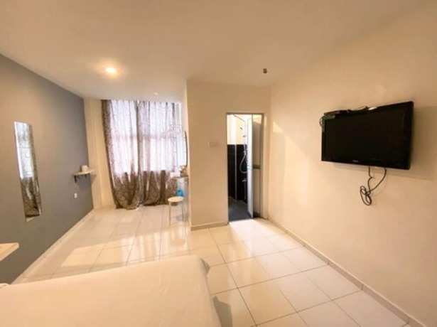 Imagen de la habitación del Hotel One One 08 Tapah. Foto 13