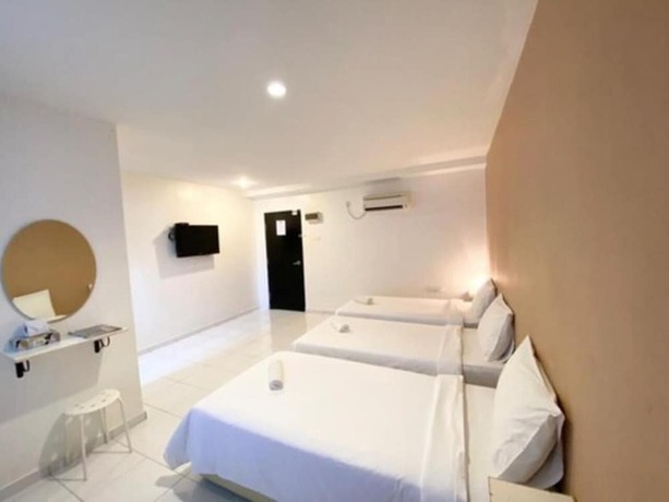Imagen de la habitación del Hotel One One 08 Tapah. Foto 20