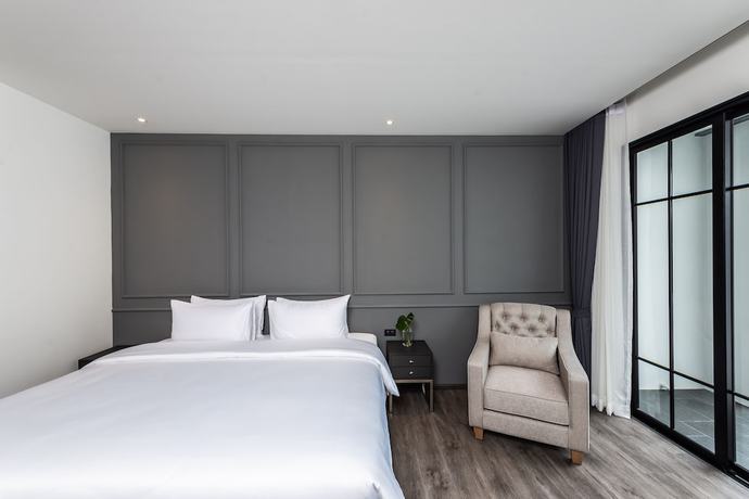 Imagen de la habitación del Hotel One Patio Hotel Pattaya. Foto 14