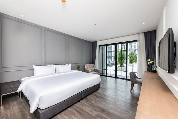 Imagen de la habitación del Hotel One Patio Hotel Pattaya. Foto 17