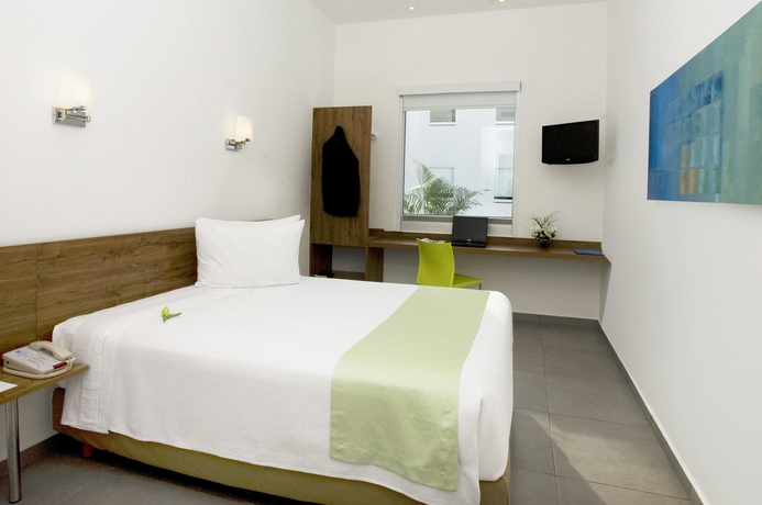 Imagen de la habitación del Hotel One Playa Del Carmen. Foto 7