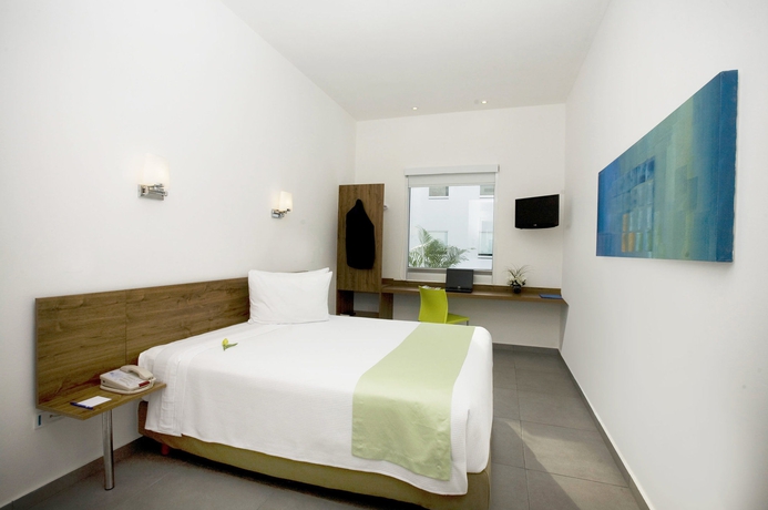 Imagen de la habitación del Hotel One Playa Del Carmen. Foto 8