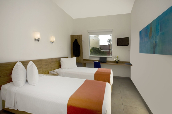 Imagen de la habitación del Hotel One Playa Del Carmen. Foto 9