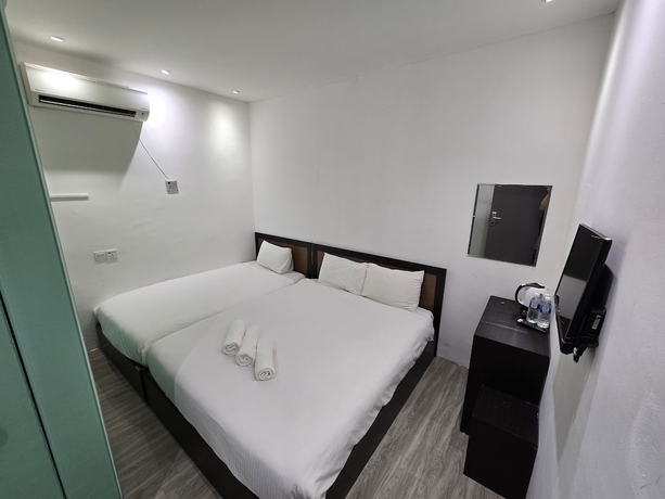 Imagen de la habitación del Hotel One Point Inn King Centre. Foto 2
