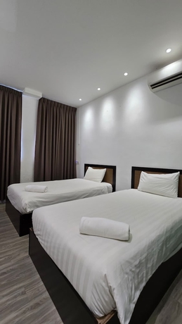 Imagen de la habitación del Hotel One Point Inn King Centre. Foto 5